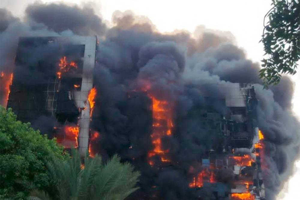 This picture taken on September 17, 2023 shows a raging fire at the Greater Nile Petroleum Oil Company Tower in Khartoum. AFPPIX