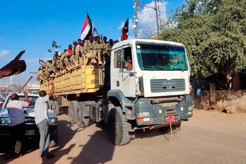 A truck carrying gunmen affiliated with Sudan’s army drives on a street in the eastern city of Gedaref on November 11, 2024. The war between rival Sudanese generals since April 2023 has killed tens of thousands of people and displaced more than 11 million, with 3.1 million of them seeking shelter beyond the country’s borders, according to the UN. - AFPpix