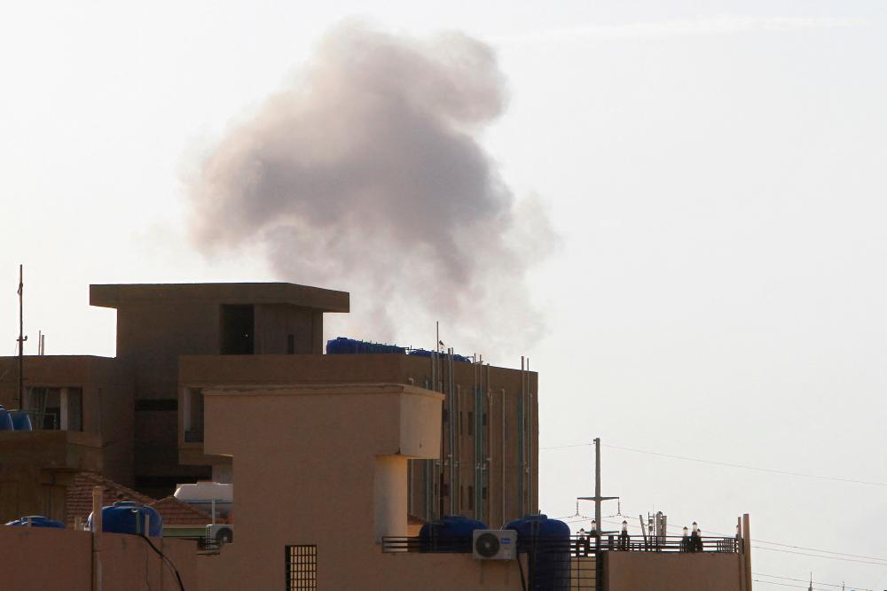 Smoke billows behind buildings in Khartoum on June 2, 2023, as fighting between Sudan’s warring generals intensified/AFPPix