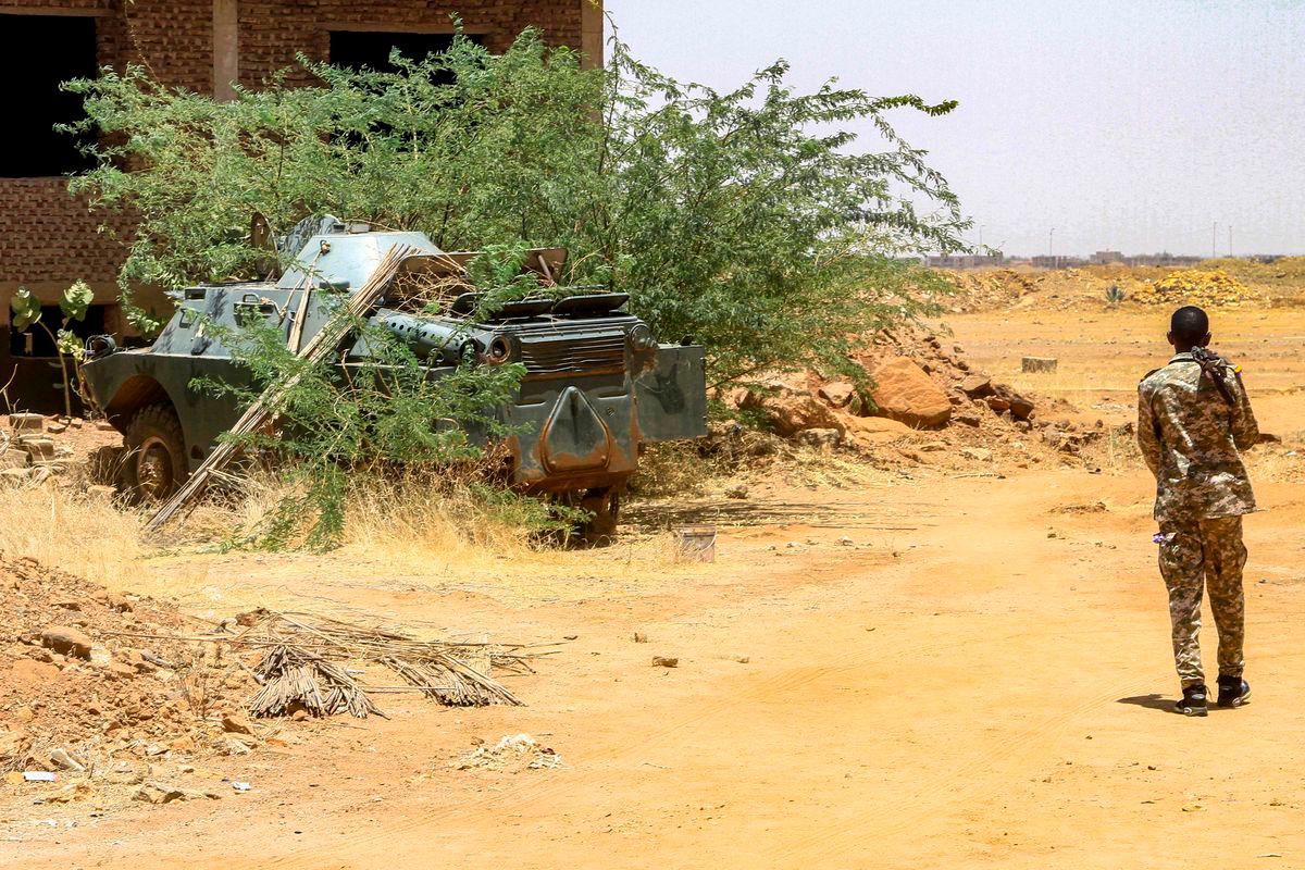 A Sudanese army soldier walks near an armoured vehicle seized after their capture of a base used by the rival Rapid Support Forces (RSF) paramilitaries after the latter group evacuated from the Salha area of Omdurman, the twin-city of Sudan’s capital, on May 26, 2025. REUTERSpix