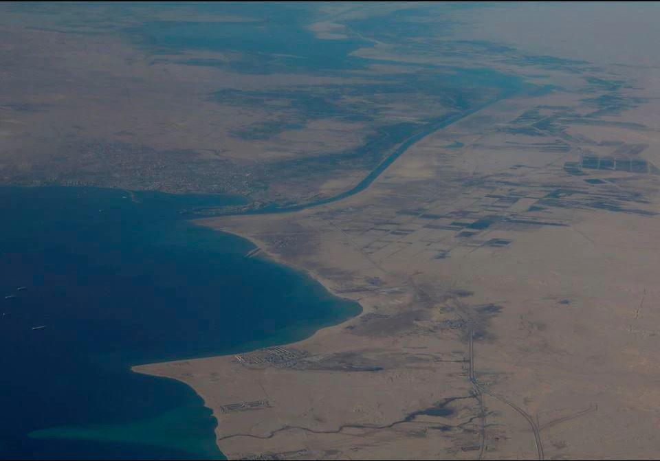 An aerial view of the Gulf of Suez and the Suez Canal are pictured through the window of an airplane on a flight between Cairo and Doha, Egypt, November 27, 2021. - REUTERSPIX