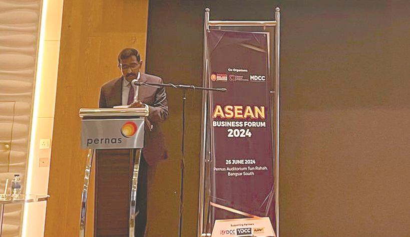 Sivasuriyamoorthy delivering his keynote address at the Asean Business Forum 2024.