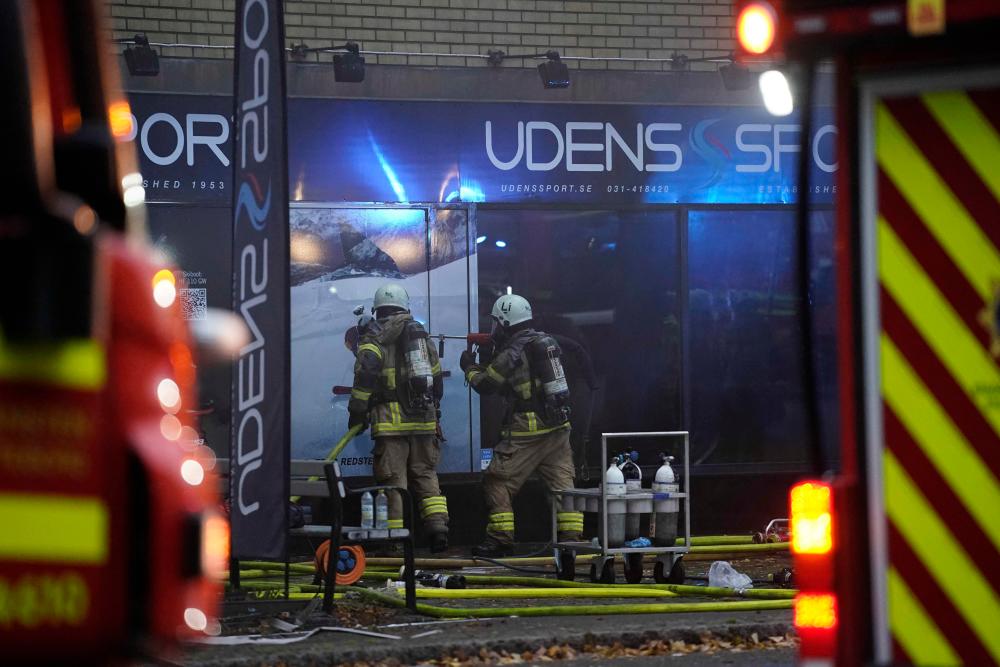 Firemen work at the site of an explosion in central Gothenburg on September 28, 2021. AFPpix
