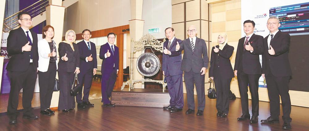 From left: M&amp;A Securities deputy head of corporate finance Danny Wong, Swift Energy Technology independent non-executive directors Yee Kim Mei and Zurul Ain Zulkarnain, executive director and COO Chin Saw Yong, Tan, Mohammad Nizar, independent non-executive director Leong Choong Wah, corporate affairs director Suzana Abu Bakar, and M&amp;A Securities managing director Datuk Bill Tan and head of corporate finance Gary Ting at the listing ceremony.