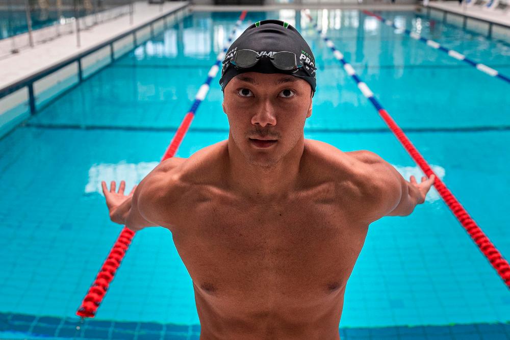 In this photo taken on April 29, 2021, Myanmar swimmer Win Htet Oo attends a training session at the Melbourne Aquatic Centre in Melbourne. Win Htet Oo is sacrificing his dream of competing in the Tokyo Olympics to protest at the junta ruling his homeland, saying that taking part would be propaganda for the regime. –AFP