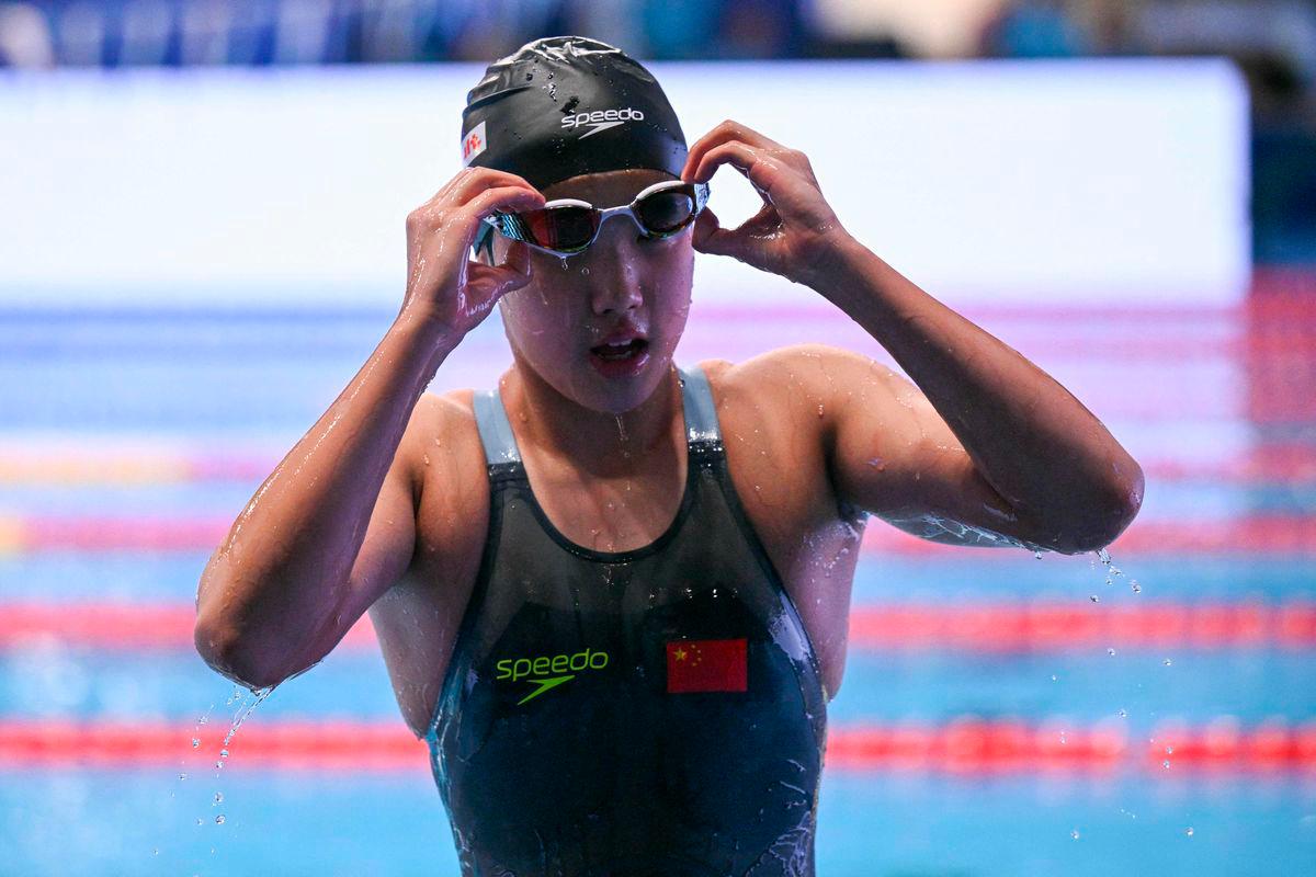 China’s swimmer Yu Zidi reacts after the final of the women’s 400m individual medley swimming event during the 2025 World Aquatics Championships in Singapore on August 3, 2025. Photo by Oli SCARFF / AFP