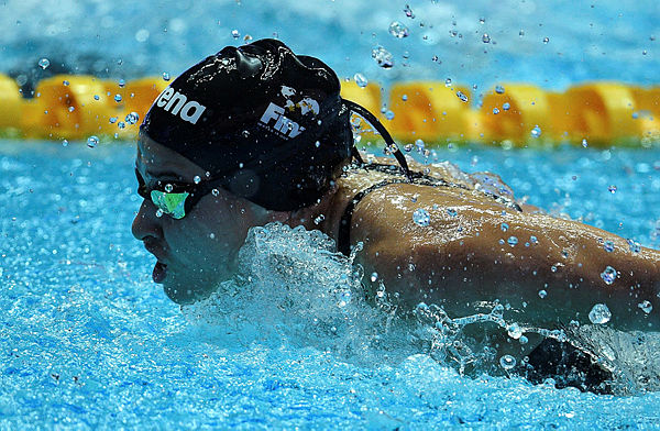 Syrian refugee Yusra Mardini competes in a heat for the women’s 100m butterfly event during the swimming competition at the 2019 World Championships at Nambu University Municipal Aquatics Center in Gwangju, South Korea, on July 21. — AFP