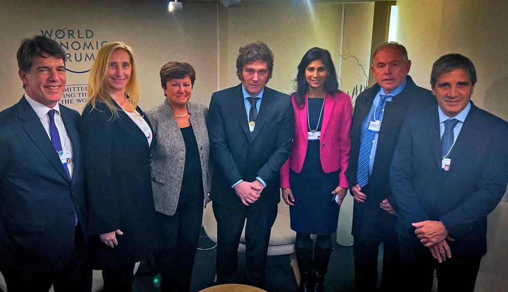 Handout picture released by the Argentine Presidency shows Milei (centre) with Georgieva (third from left), IMF first deputy managing director Gita Gopinath (third from right), Argentina's Cabinet Chief Nicolas Posse (left), Argentina's General Secretary of the Presidency Karina Milei (second from left), Argentina's ambassador to the US Gerardo Werthein (second from right) and Argentina's Economy Minister Luis Caputo (right) during a bilateral meeting at the World Economic Forum in Davos on Wednesday. – AFP/Argentinian Presidency pic