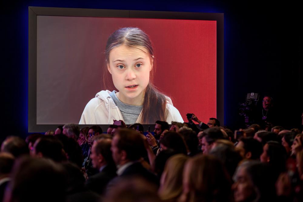 Swedish climate activist Greta Thunberg attends a session at the Congres center during the World Economic Forum (WEF) annual meeting in Davos, on Jan 21. — AFP