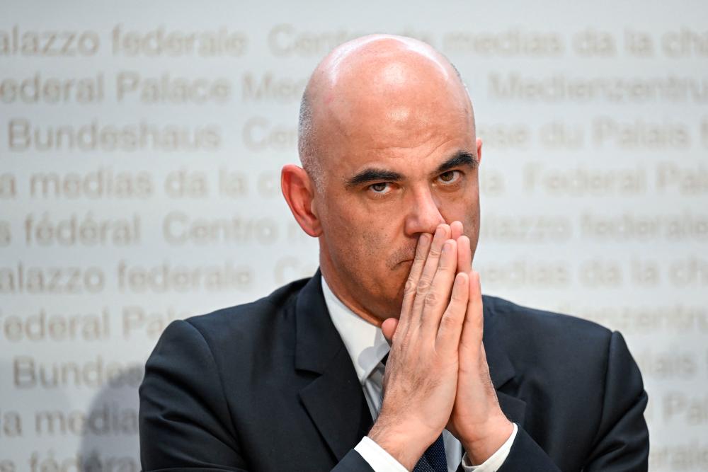 Swiss President Alain Berset gestures during a press conference in Bern on March 19, 2023. AFPPIX