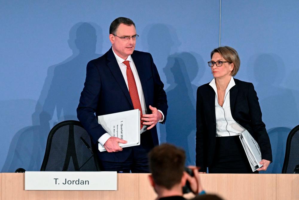 Swiss National Bank chairman Thomas Jordan (left) and governing board member Andrea Maechler at a news conference in Zurich on Thursday, March 23, 2023. – AFPpic