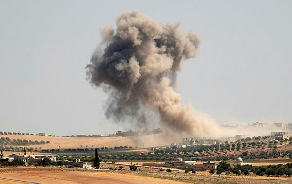 Smoke billows during pro-regime bombardments in the area of Maar Hitat in Syria’s northern Idlib province on August 20, 2019. — AFP