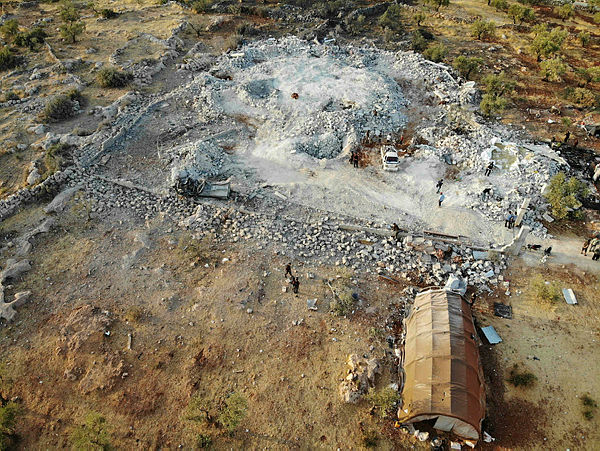 An aerial view taken on October 27, 2019 shows the site that was hit by helicopter gunfire which reportedly killed nine people near the northwestern Syrian village of Barisha in the Idlib province along the border with Turkey, where “groups linked to the Islamic State (IS) group” were present, according to a Britain-based war monitor with sources inside Syria. — AFP