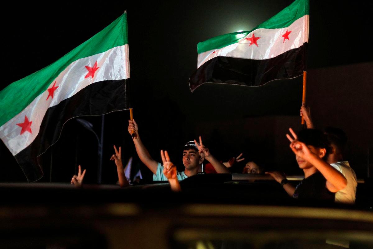 People celebrate in Damascus’ Omeyyad square after US President Donald Trump’s decision to lift sanctions in Syria, on May 13, 2025. AFPpix