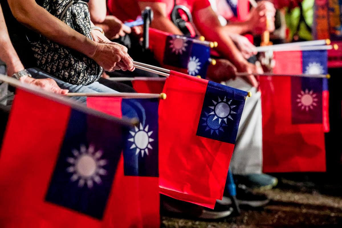 Supporters of Taiwan's main opposition party, Kuomintang (KMT), participate in a rally against the recall election in front of the Presidential Office in Taipei on July 25, 2025. - AFPPIX