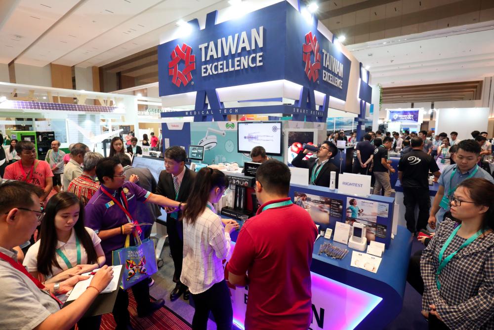 Visitors visit Taiwan Excellence booth during Taiwan Expo 2019 at Spice Convention Centre, Penang on July 8, 2019. — Sunpix by Masry Che Ani