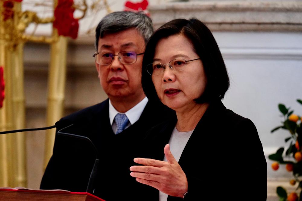 Taiwan President Tsai Ing-wen speaks during a press conference at the presidential office as Vice President Chen Chien-jen looks on in Taipei on Jan 22. — AFP