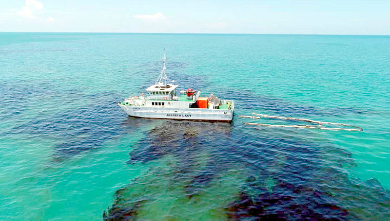 A boat belonging to the Southern Region Marine Department is seen patrolling the area affected by oil spill, on April 18, 2019. — Bernama