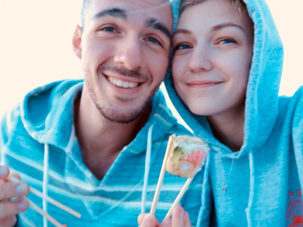 Gabrielle Petito, 22, who was reported missing on Sept. 11, 2021 after traveling with her boyfriend around the country in a van and never returned home, poses for a photo with Brian Laundrie in this undated handout photo. North Port/Florida Police/Handout via Reuters.