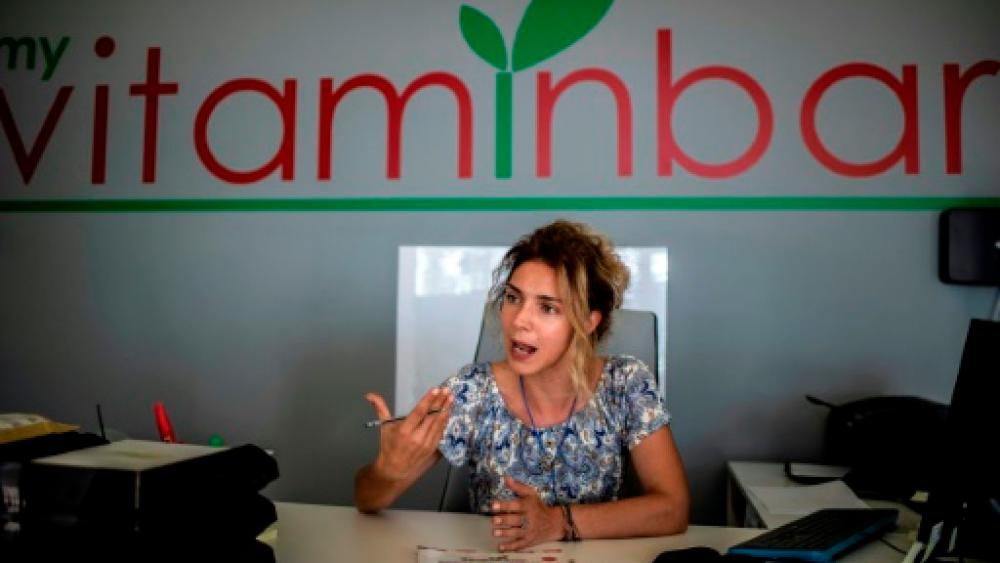 Business professionals like Vitamin Bar’s Elena Kouretsi welcome pledges by Greece’s new Prime Minister Kyriakos Mitsotakis to lower taxes — AFP