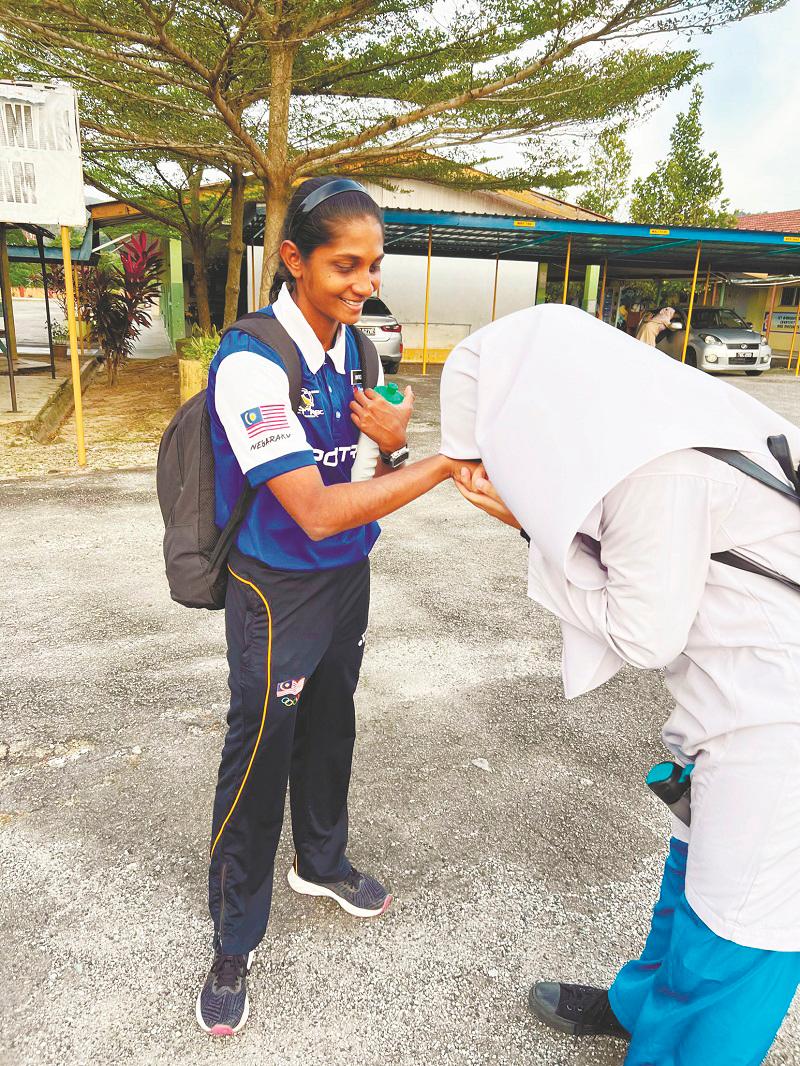 Being a teacher allows Winifred to pass on her skills as a sports woman $!Being a teacher allows Winifred to pass on her skills as a sports woman