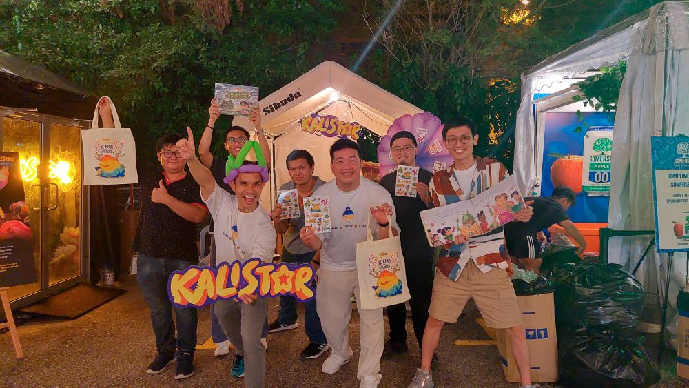 $!Team Circle Studio celebrate their milestone achievement.