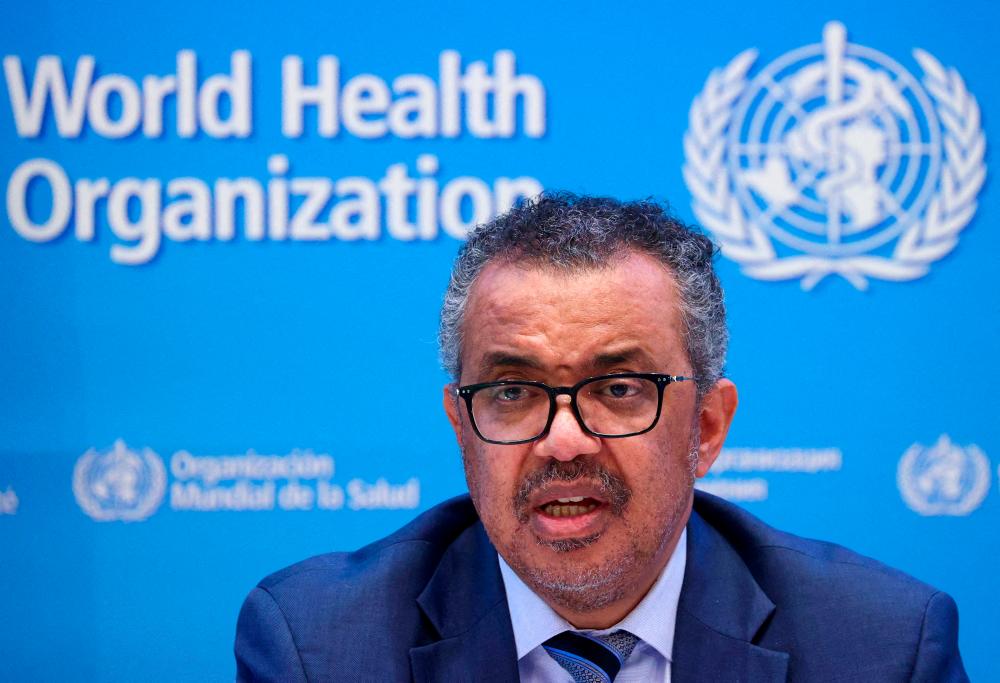 FILE PHOTO: Tedros Adhanom Ghebreyesus, Director-General of the World Health Organization (WHO), speaks during a news conference in Geneva, Switzerland, December 20, 2021. REUTERSpix