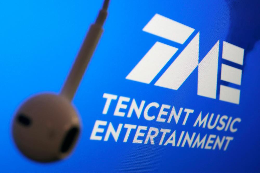 The logo of Tencent Music is seen next to an earphone in this illustration picture. REUTERSpix