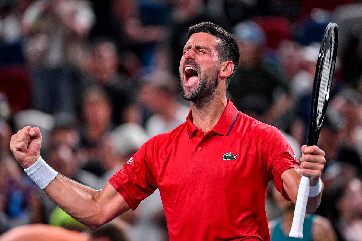 Serbia’s Novak Djokovic celebrates after winning against Germany’s Yannick Hanfmann during their men’s singles match at the Shanghai Masters tennis tournament. - Hector RETAMAL / AFP
