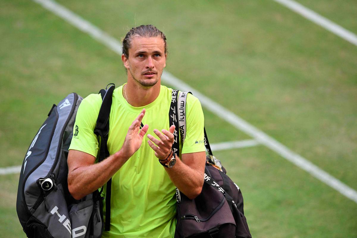 Germany's Alexander Zverev reacts at the end of his tennis match against Italy's Lorenzo Sonego during the Halle Open ATP tennis tournament in Halle, on June 19, 2025. - AFPPIX