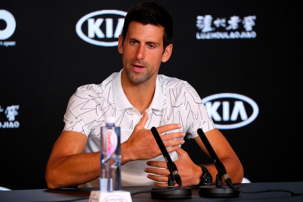 Serbia's Novak Djokovic speaks during a press conference ahead of the Australian Open tennis tournament in Melbourne on January 19, 2020. - AFP