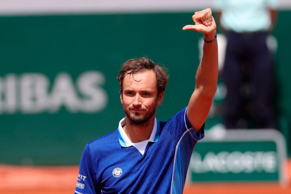 Daniil Medvedev reacts after winning against Serbia’s Miomir Kecmanovic during their men’s singles match on day seven of the Roland-Garros Open tennis tournament at the Court Suzanne-Lenglen in Paris on May 28, 2022. AFPPIX