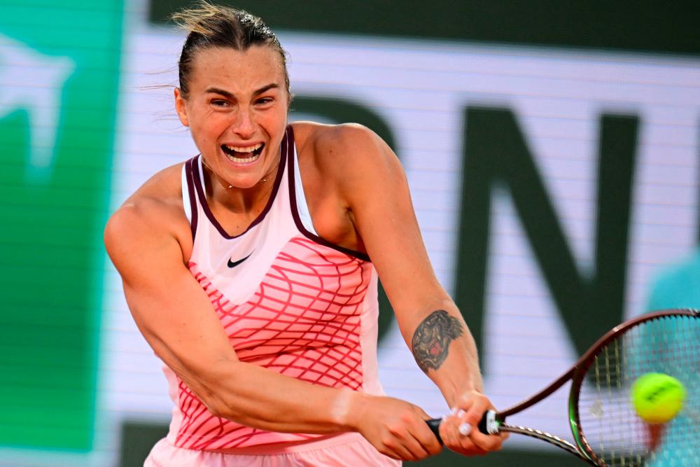 Belarus’ Aryna Sabalenka plays a backhand return to US Sloane Stephens during their women’s singles match on day eight of the Roland-Garros Open tennis tournament at the Court Philippe-Chatrier in Paris on June 4, 2023/AFPpix