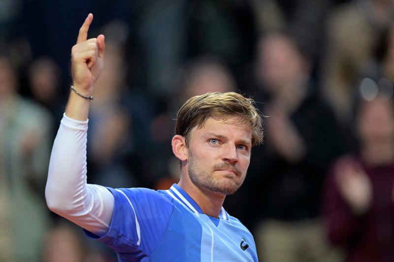 Belgium's David Goffin celebrates after winning his men's singles match against France's Giovanni Mpetshi Perricard on day three of the French Open tennis tournament at the Roland Garros Complex in Paris on May 28, 2024. - AFPPIX