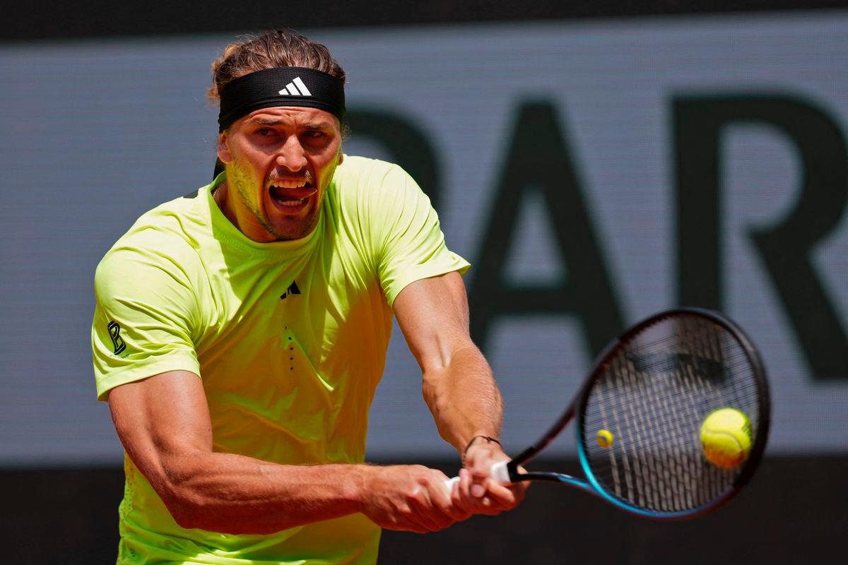 Germany’s Alexander Zverev plays a backhand return to Netherlands’ Tallon Griekspoor during their men’s singles match on day 9 of the French Open tennis tournament on Court Suzanne-Lenglen at the Roland-Garros Complex in Paris on June 2, 2025. (Photo by Dimitar DILKOFF / AFP)