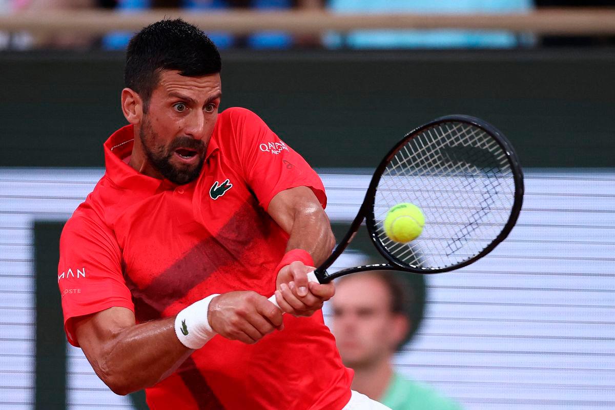 Djokovic beats Misolic at Roland Garros while fans cheer PSG’s UCL win; Serb jokes about missing the 5-0 final and Paris celebrations. AFPpix