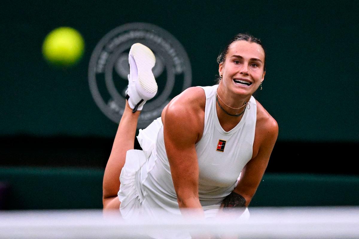 Belarus’s Aryna Sabalenka eyes the ball as she returns it to Belgium’s Elise Mertens during their women’s singles fourth round tennis match on the seventh day of the 2025 Wimbledon Championships at The All England Lawn Tennis and Croquet Club in Wimbledon, southwest London, on July 6, 2025- AFP