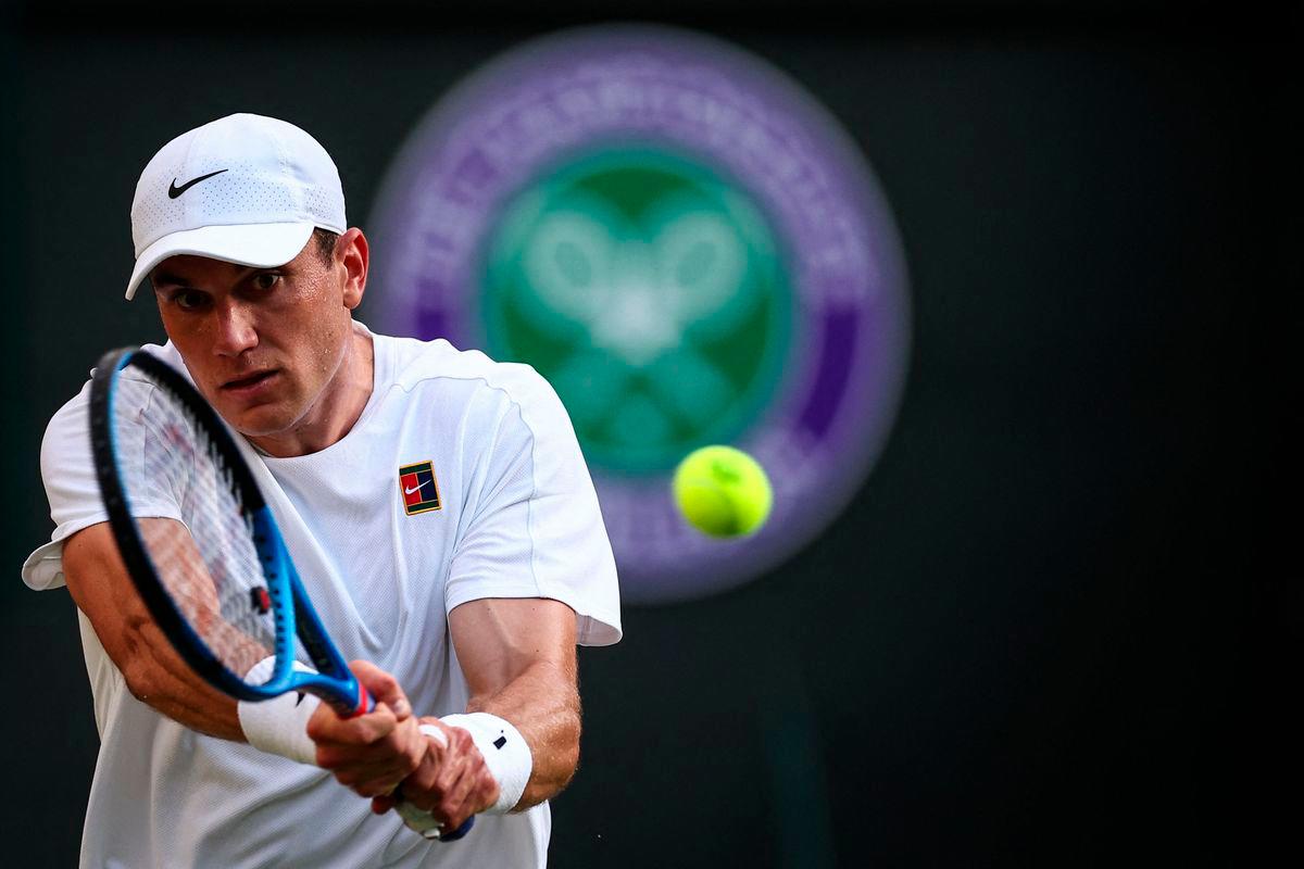 Britain’s Jack Draper returns the ball to Argentina’s Sebastian Baez during their men’s singles first round tennis match on the second day of the 2025 Wimbledon Championships at The All England Lawn Tennis and Croquet Club in Wimbledon, southwest London, on July 1, 2025- AFP