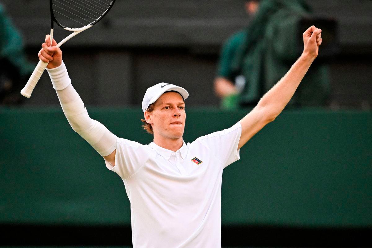 Italy’s Jannik Sinner celebrates after victory against Spain’s Carlos Alcaraz at the end of their men’s singles final tennis match on the fourteenth day of the 2025 Wimbledon Championships at The All England Lawn Tennis and Croquet Club in Wimbledon, southwest London, on July 13, 2025 - PHOTO BY Kirill KUDRYAVTSEV / AFP