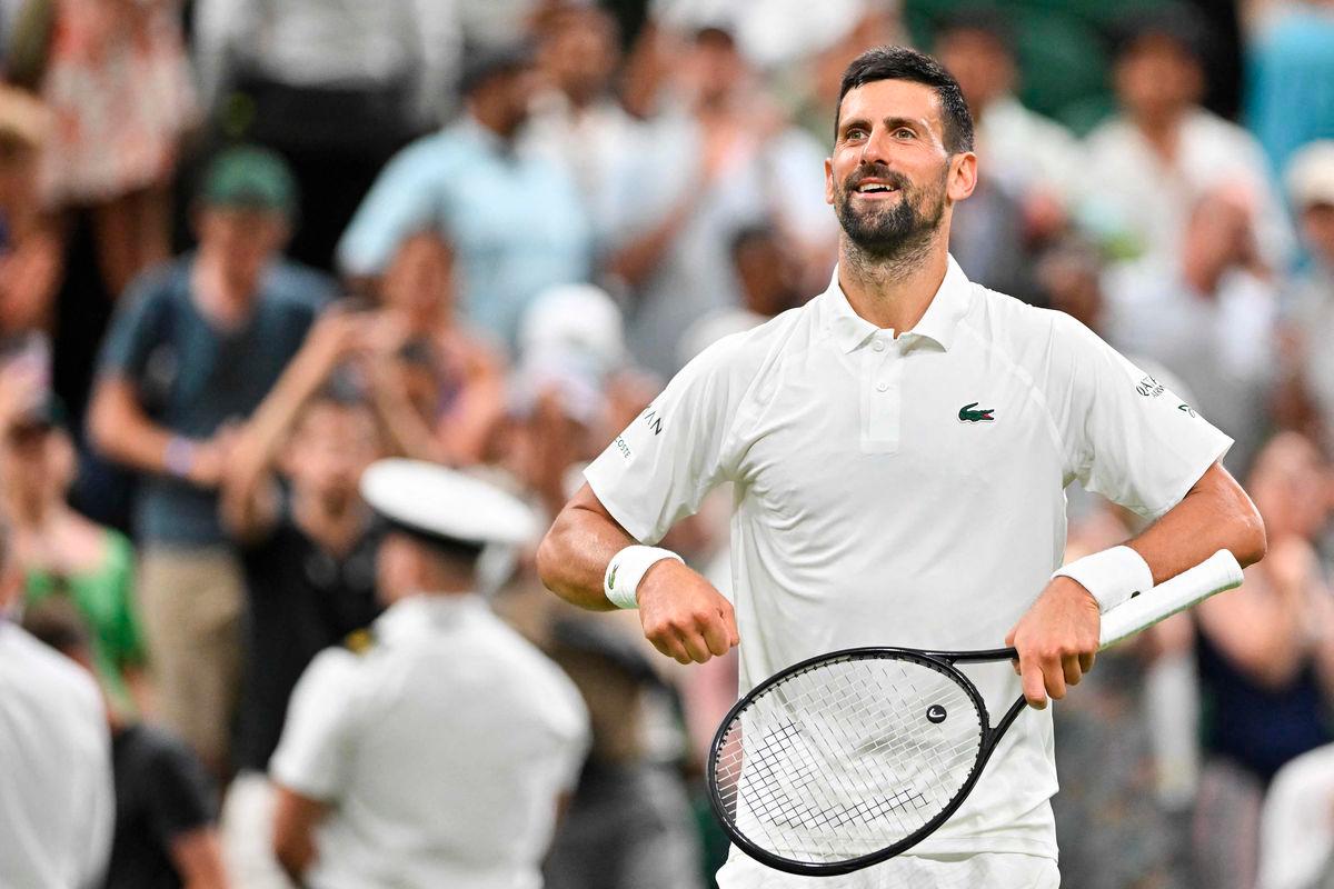 Serbia’s Novak Djokovic celebrates winning against France’s Alexandre Muller at the end of their men’s singles first round tennis match on the second day of the 2025 Wimbledon Championships at The All England Lawn Tennis and Croquet Club in Wimbledon, southwest London, on July 1, 2025- AFP