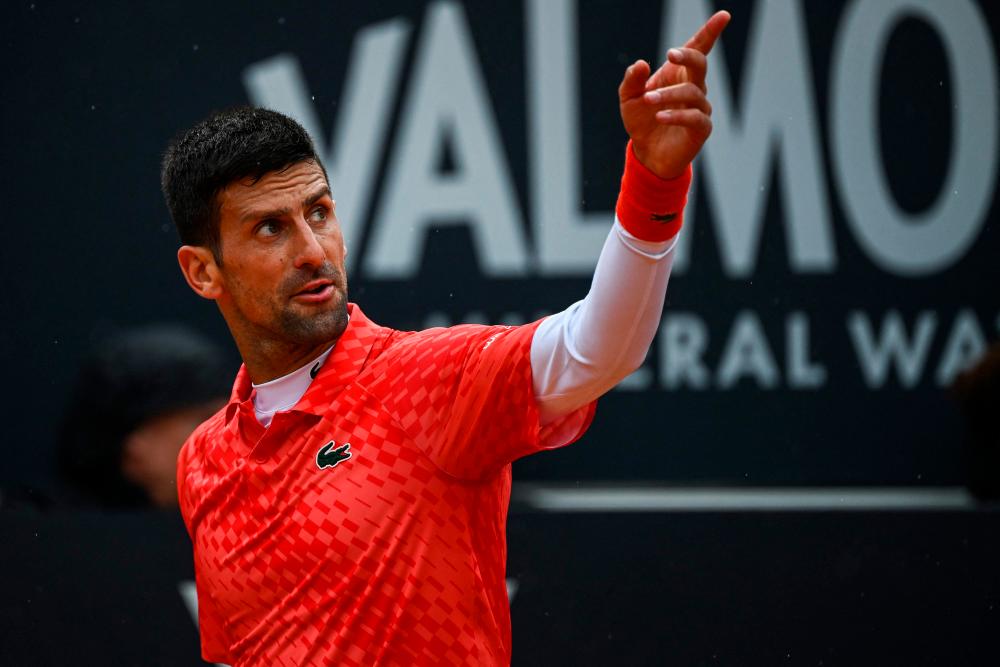 Serbia’s Novak Djokovic reacts during his quarterfinals match of the Men’s ATP Rome Open tennis tournament against Denmark’s Holger Rune, at Foro Italico in Rome on May 17, 2023/AFPpix