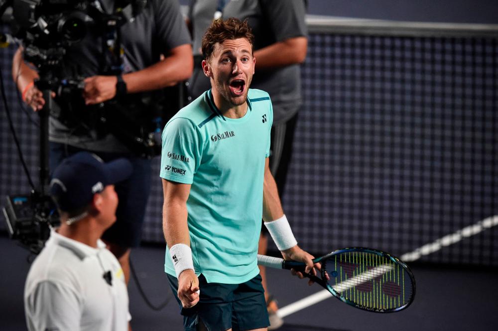 Norway's Casper Ruud celebrates his victory over Denmark's Holger Rune during the Mexico ATP Open 500 men's singles semi-final tennis match at Arena GNP Seguros in Acapulco, Guerrero State, Mexico on March 1, 2024. - AFPPIX