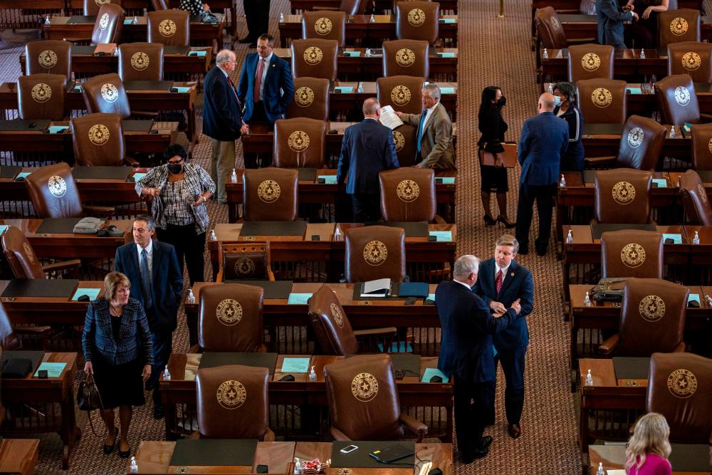 Following a second special session that saw the passage of controversial voting and abortion laws, Texas lawmakers have convened at the Capitol for a third special session to address more of Republican Gov/AFPPix
