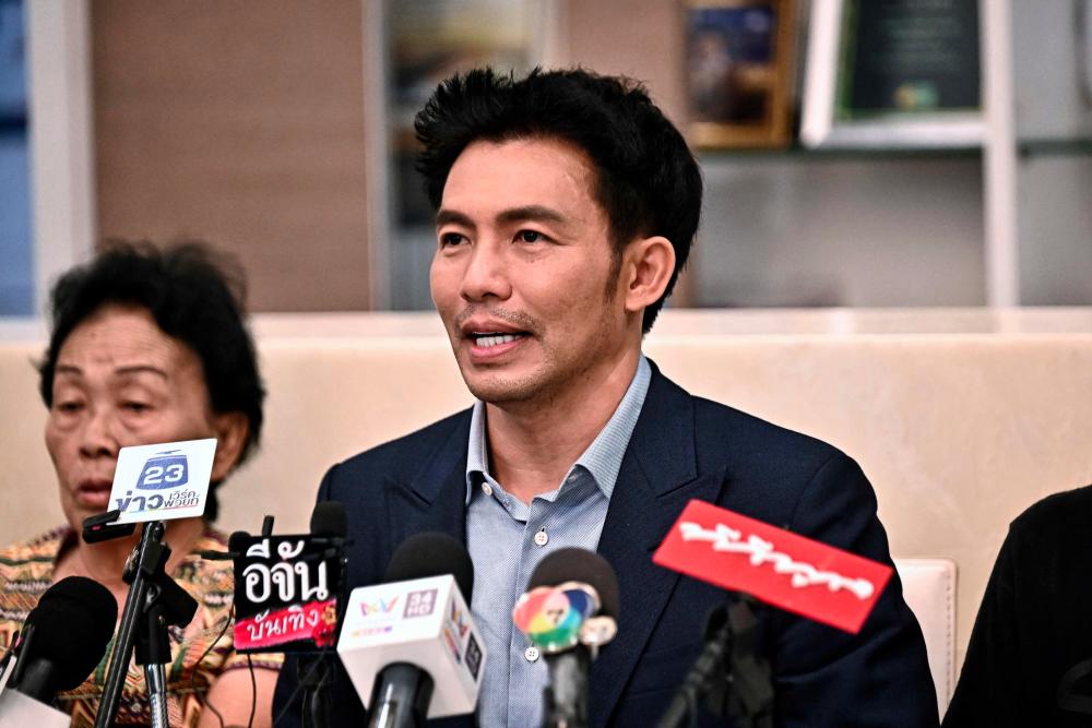 Thai plastic surgeon Nopparat Rattanawaraha describes his ordeal of being kidnapped in Mali, during a press conference at Nopparat Cosmetic Clinic in Bangkok on October 27, 2022. - AFPPIX