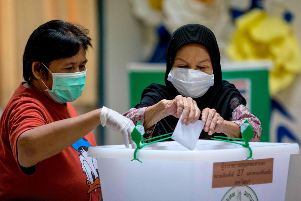 A woman casts her vote in the governor elections in Bangkok on May 22, 2022. AFPPIX