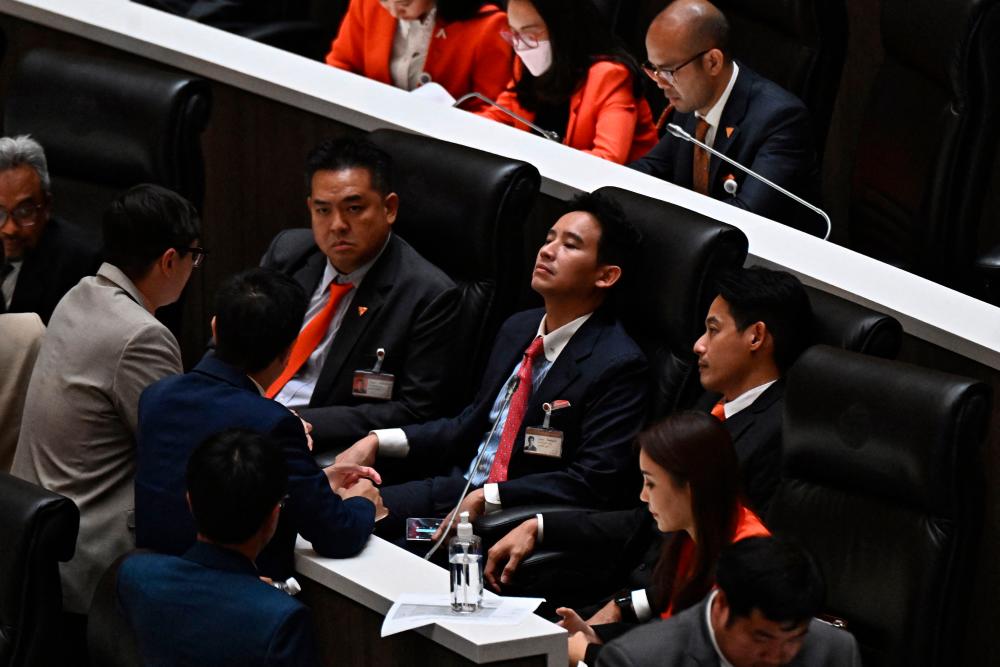 Move Forward Party Leader and prime ministerial candidate Pita Limjaroenrat reacts inside Thai Parliament as votes are counted during the parliamentary vote for the premiership in Bangkok on July 13, 2023/AFPPix