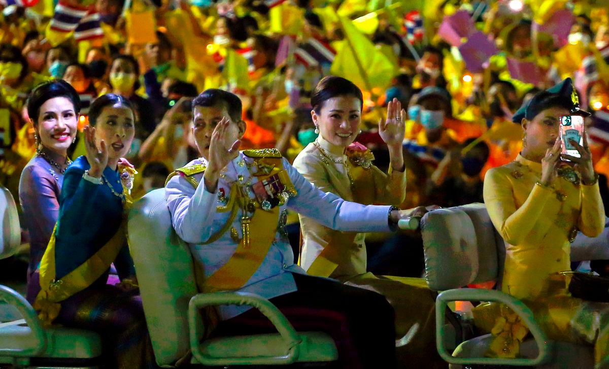 Thailand’s King Maha Vajiralongkorn (C) talks to Princess Bajrakitiyabha Mahidol (2nd L) as they sit with Queen Suthida (2nd R), Princess Sirivannavari Nariratana (R) and royal noble consort Sineenat Bilaskalayani (L), also known as Sineenat Wongvajirapakdi, in a golf buggy during a ceremony to commemorate the birthday of the late Thai king Bhumibol Adulyadej at Sanam Luang in Bangkok on December 5, 2020. AFPPix
