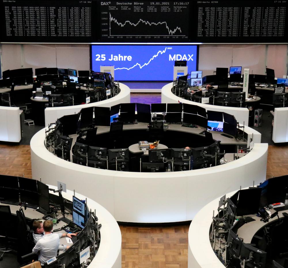 The German share price index DAX graph is pictured at the stock exchange in Frankfurt, Germany. The mushrooming of mobile trading apps has made it easy for amateur stock pickers to access the US$85 trillion global stock market. – REUTERSPIX