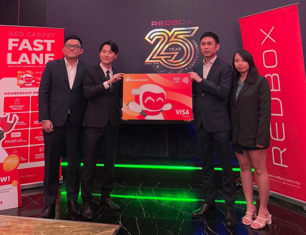 (From left to right) Red Box Group CEO Karl Khoo; Red Box Group General Manager Terry Swee; TOGL Technology Chief Marketing Officer Calvert Choo; RewardsLink Business Development Manager Alice Lua.