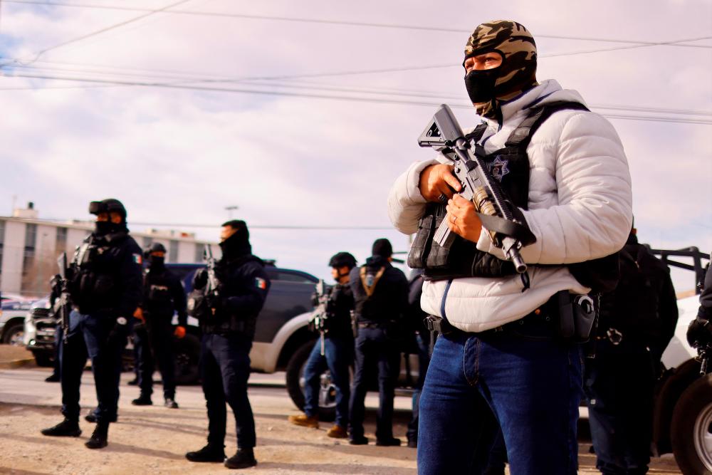 Security forces arrive to the Cereso number 3 state prison after unknown assailants entered the prison and freed several inmates, resulting in injuries and deaths, according to local media, in Ciudad Juarez, Mexico January 1, 2023. REUTERSPIX